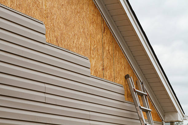 Professional Emergency Siding Repair technician working in Loveland, OH
